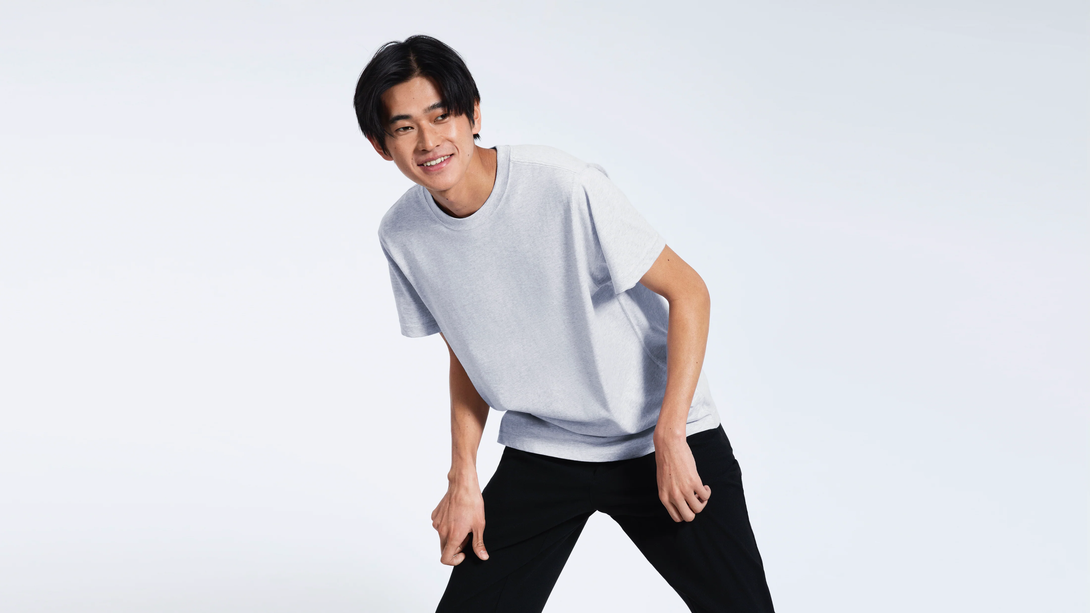 man showing off his shirt - Best T-Shirt Material for Printing